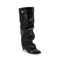 Black knee-high boot on a white background